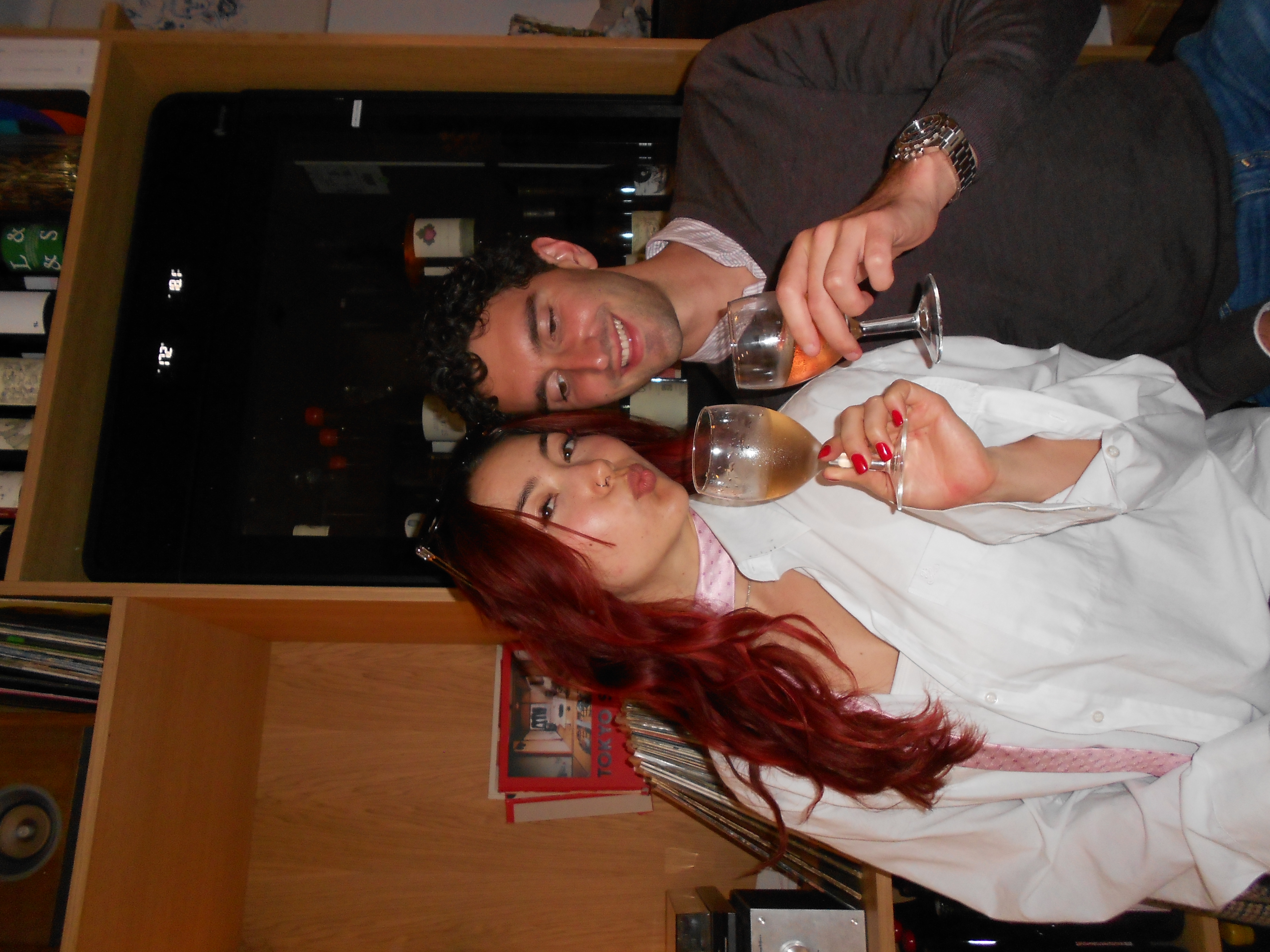 Lily and a friend sharing wine in Paris